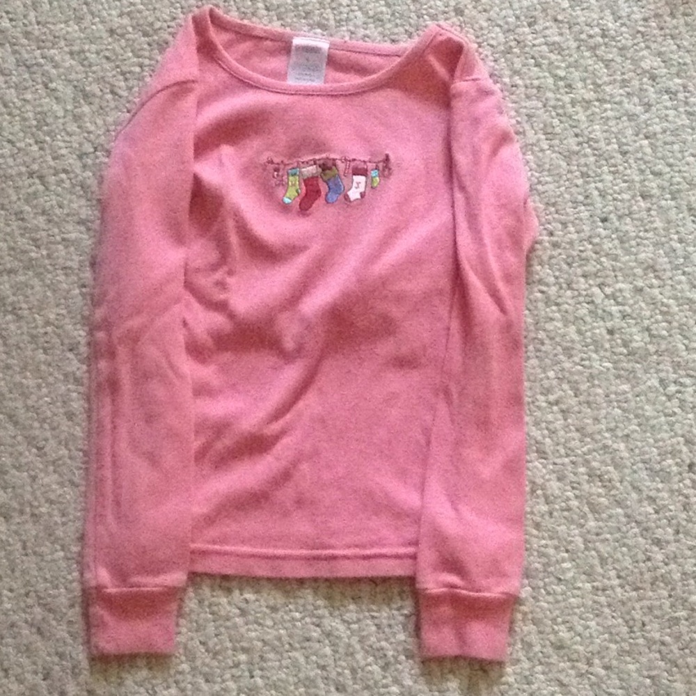 Pink Christmas pajama shirt.
